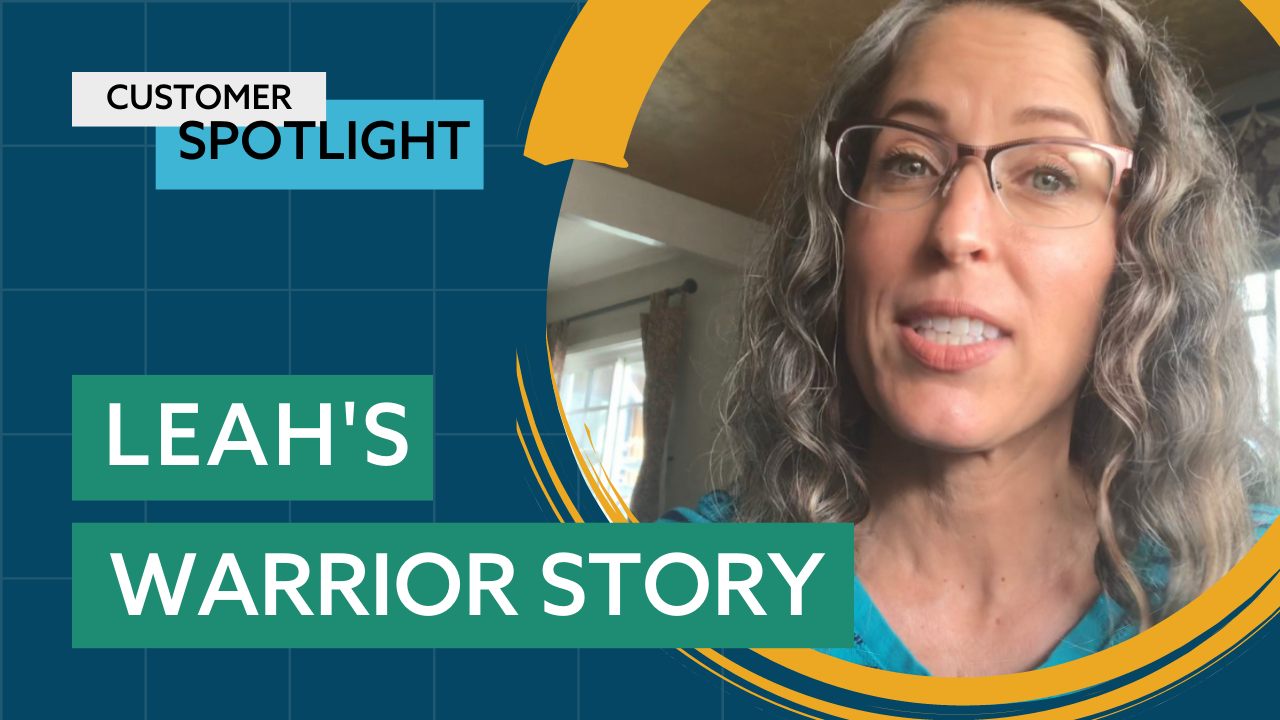 A person with long, curly gray hair and glasses is speaking. The background has a blue and yellow design with the text "Customer Spotlight" and "Leah's Warrior Story" in white and green boxes.