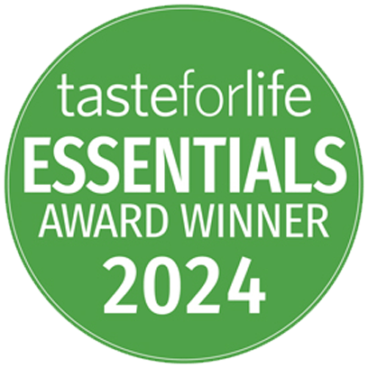 A green circular badge with the text "tasteforlife ESSENTIALS AWARD WINNER 2024" in white uppercase letters, indicating recognition for the year 2024.