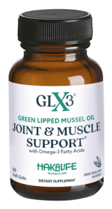 A brown bottle of GLX3 Green Lipped Mussel Oil Joint & Muscle Support dietary supplement by Haka Life Nutrition. The label mentions it contains Omega-3 fatty acids, includes 60 soft gels, and is made in New Zealand.